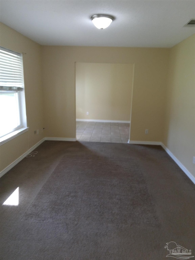 view of carpeted spare room