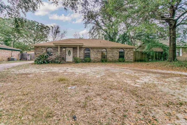 ranch-style house with central air condition unit