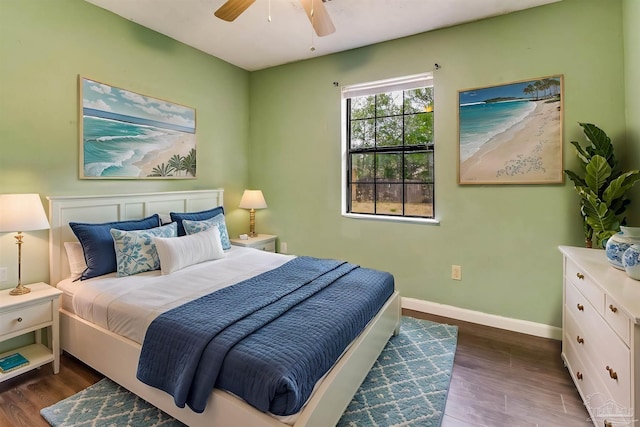 bedroom featuring dark wood-type flooring and ceiling fan