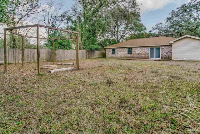 view of yard with a pergola