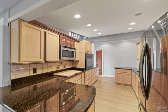 204 Camelia St, Gulf Breeze, FL 32561 - kitchen featuring stainless steel appliances, backsplash, light brown cabinets, a peninsula, and light wood-style floors