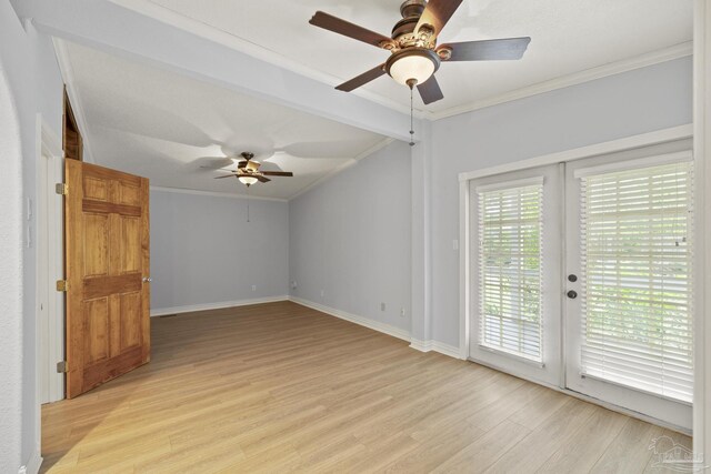 204 Camelia St, Gulf Breeze, FL 32561 - empty room with a ceiling fan, light wood-type flooring, lofted ceiling, ornamental molding, and baseboards