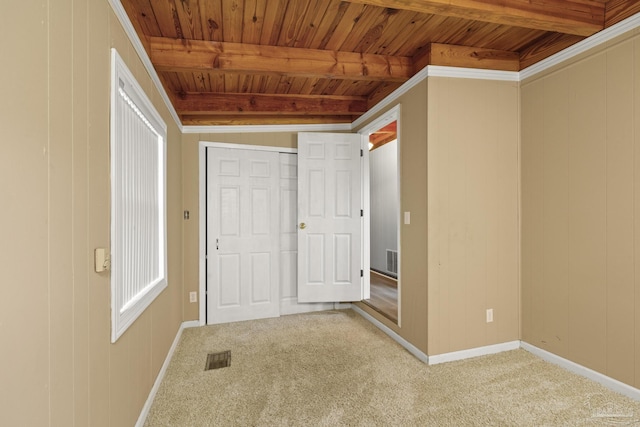 204 Camelia St, Gulf Breeze, FL 32561 - unfurnished bedroom with wood ceiling with exposed beams, carpet flooring, baseboards, and a closet