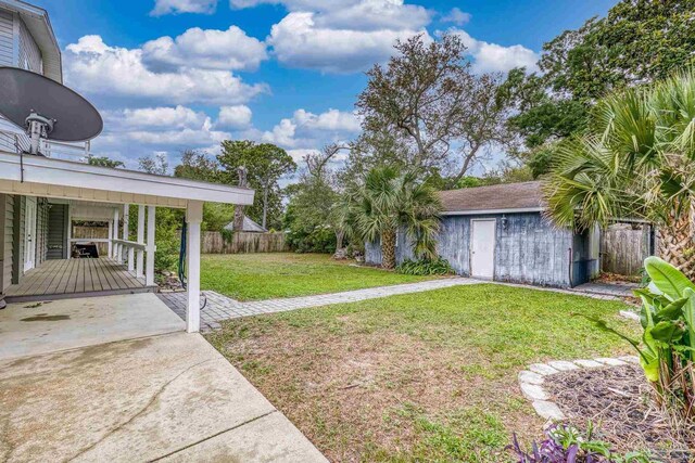 204 Camelia St, Gulf Breeze, FL 32561 - view of yard with an outbuilding