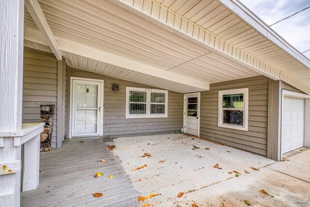 204 Camelia St, Gulf Breeze, FL 32561 - wooden deck with a patio area