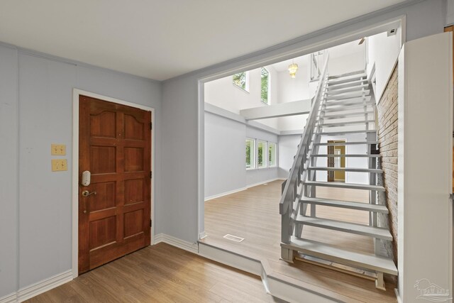 204 Camelia St, Gulf Breeze, FL 32561 - entrance foyer with wood finished floors and baseboards