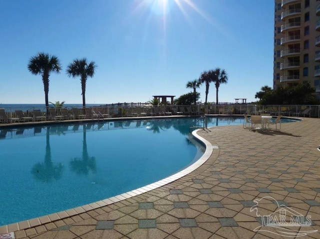 view of pool featuring a patio