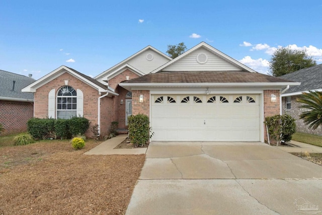 ranch-style home featuring a garage