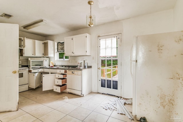 kitchen featuring dark countertops, white appliances, decorative light fixtures, and white cabinets