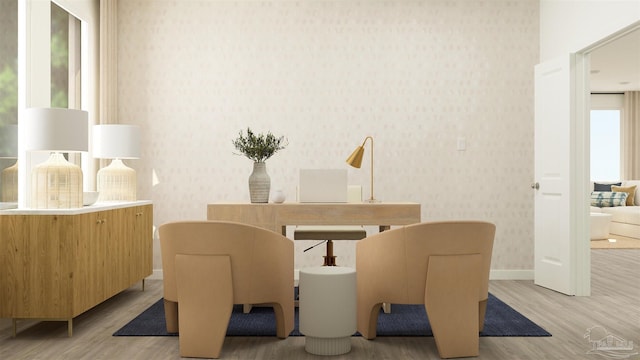 dining area with light hardwood / wood-style flooring