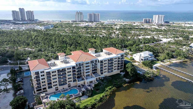 birds eye view of property featuring a water view