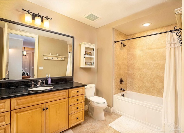 full bathroom with toilet, tile patterned floors, shower / tub combo with curtain, and vanity