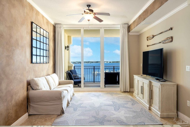 living room featuring floor to ceiling windows, crown molding, and ceiling fan