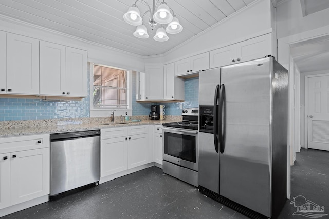 kitchen featuring white cabinets, tasteful backsplash, a sink, appliances with stainless steel finishes, and a notable chandelier