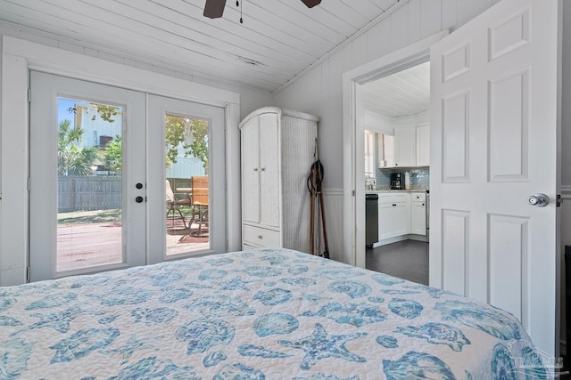 bedroom featuring access to outside, ceiling fan, and french doors