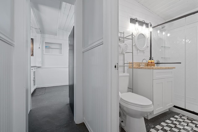 bathroom with vanity, toilet, and lofted ceiling