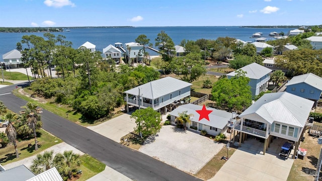 bird's eye view with a residential view and a water view