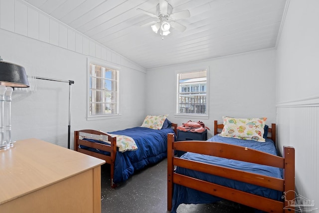 bedroom featuring wooden ceiling, a ceiling fan, ornamental molding, and lofted ceiling
