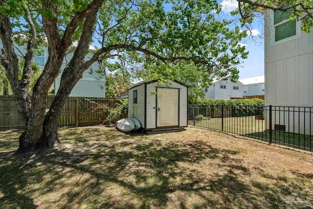 view of shed featuring a fenced backyard