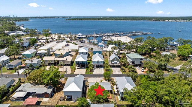 aerial view with a residential view and a water view