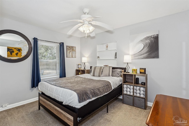 bedroom featuring light colored carpet and ceiling fan