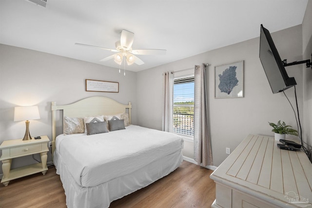 bedroom featuring ceiling fan and wood-type flooring