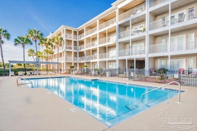 view of swimming pool featuring a patio