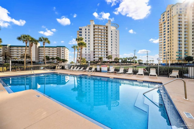 view of swimming pool featuring a patio