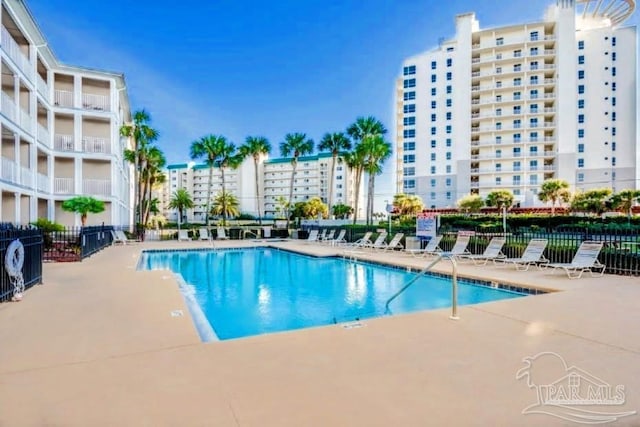 view of pool featuring a patio area