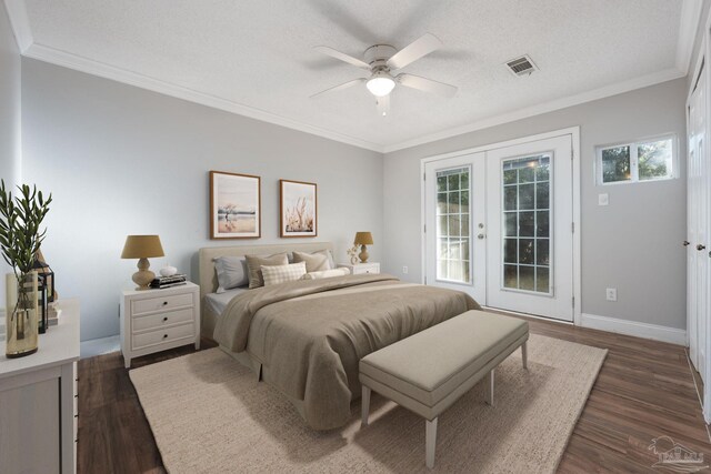 bedroom with ceiling fan, french doors, dark hardwood / wood-style flooring, a textured ceiling, and access to outside