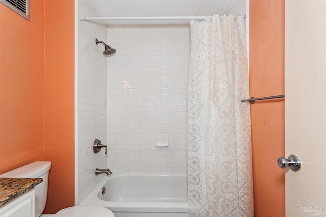 bathroom featuring vanity and shower / bath combo with shower curtain