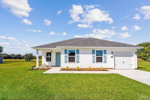 ranch-style house with a garage and a front yard