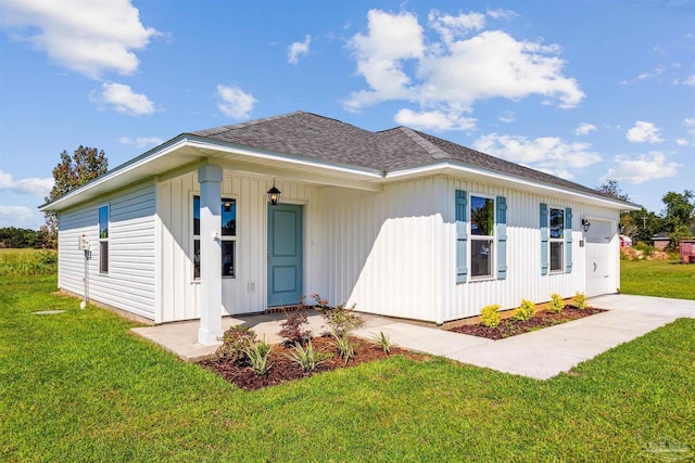 exterior space with a front lawn