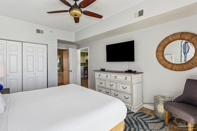 bedroom featuring ceiling fan and a closet