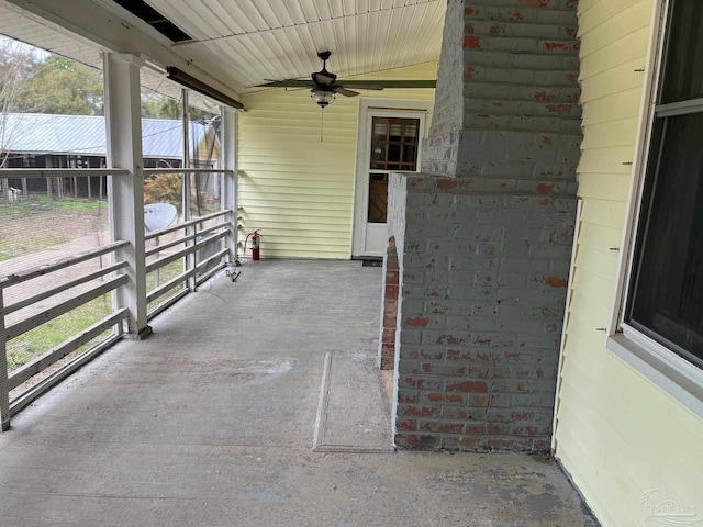 view of patio with ceiling fan