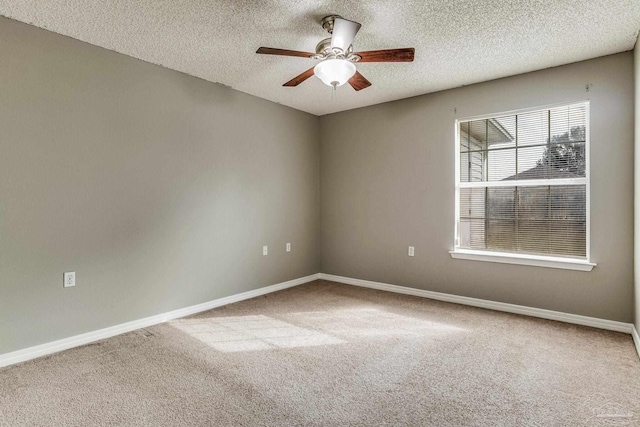 321 Loveland Cir, Pensacola, FL 32526 - carpeted spare room featuring a ceiling fan, baseboards, and a textured ceiling