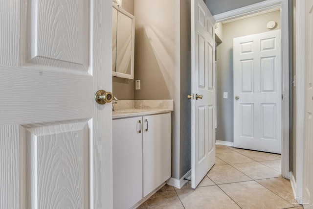 bathroom featuring vanity and tile patterned flooring