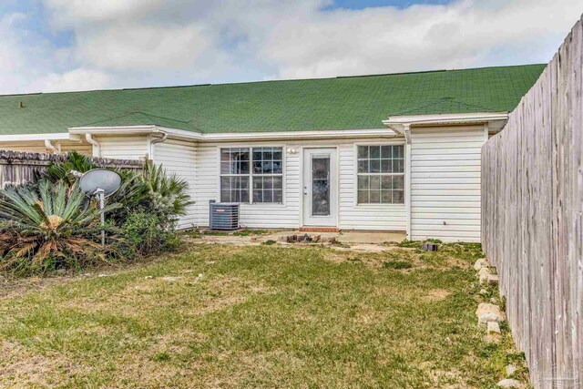 321 Loveland Cir, Pensacola, FL 32526 - rear view of property with central AC unit