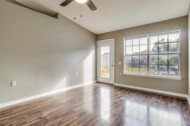 unfurnished room featuring a textured ceiling, ceiling fan, and dark hardwood / wood-style flooring