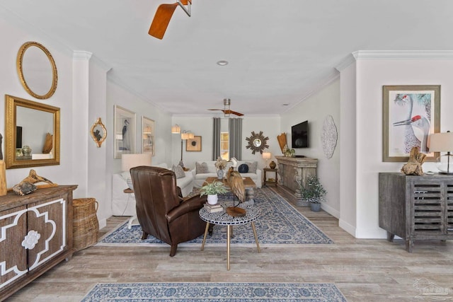 8209 Pompano St, Navarre, FL 32566 - living area with ornamental molding, a ceiling fan, and wood finished floors