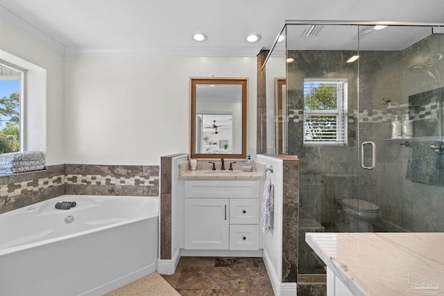 8209 Pompano St, Navarre, FL 32566 - full bathroom with vanity, healthy amount of natural light, a stall shower, a garden tub, and crown molding