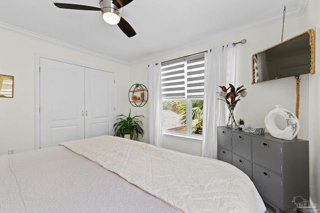 8209 Pompano St, Navarre, FL 32566 - bedroom with crown molding, a ceiling fan, and a closet