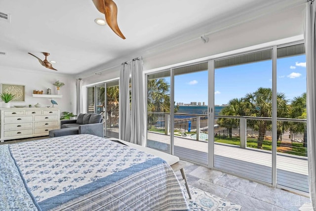 8209 Pompano St, Navarre, FL 32566 - bedroom with access to outside, a ceiling fan, and a water view