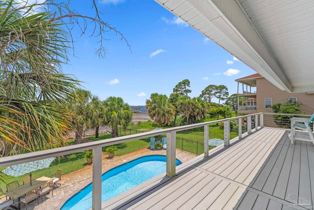 8209 Pompano St, Navarre, FL 32566 - wooden terrace featuring an outdoor pool