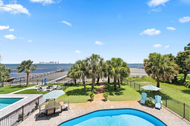 8209 Pompano St, Navarre, FL 32566 - view of swimming pool with a water view and a patio