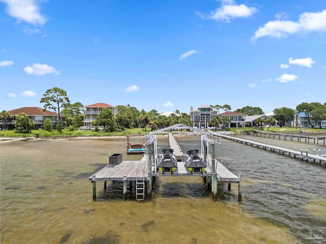 8209 Pompano St, Navarre, FL 32566 - dock featuring boat lift, a water view, and a residential view