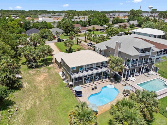 8209 Pompano St, Navarre, FL 32566 - aerial perspective of suburban area with a pool