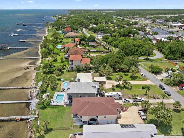 8209 Pompano St, Navarre, FL 32566 - aerial view of property and surrounding area with a large body of water and a pool area