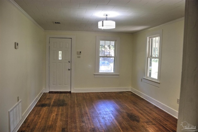 foyer with dark hardwood / wood-style flooring and ornamental molding