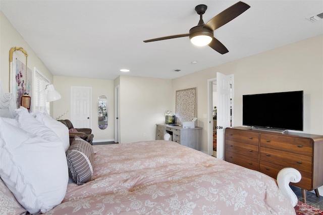 bedroom featuring visible vents and ceiling fan